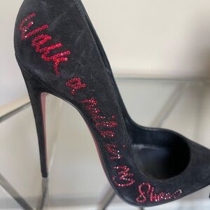 Black suede Christian Louboutin pump- gently used